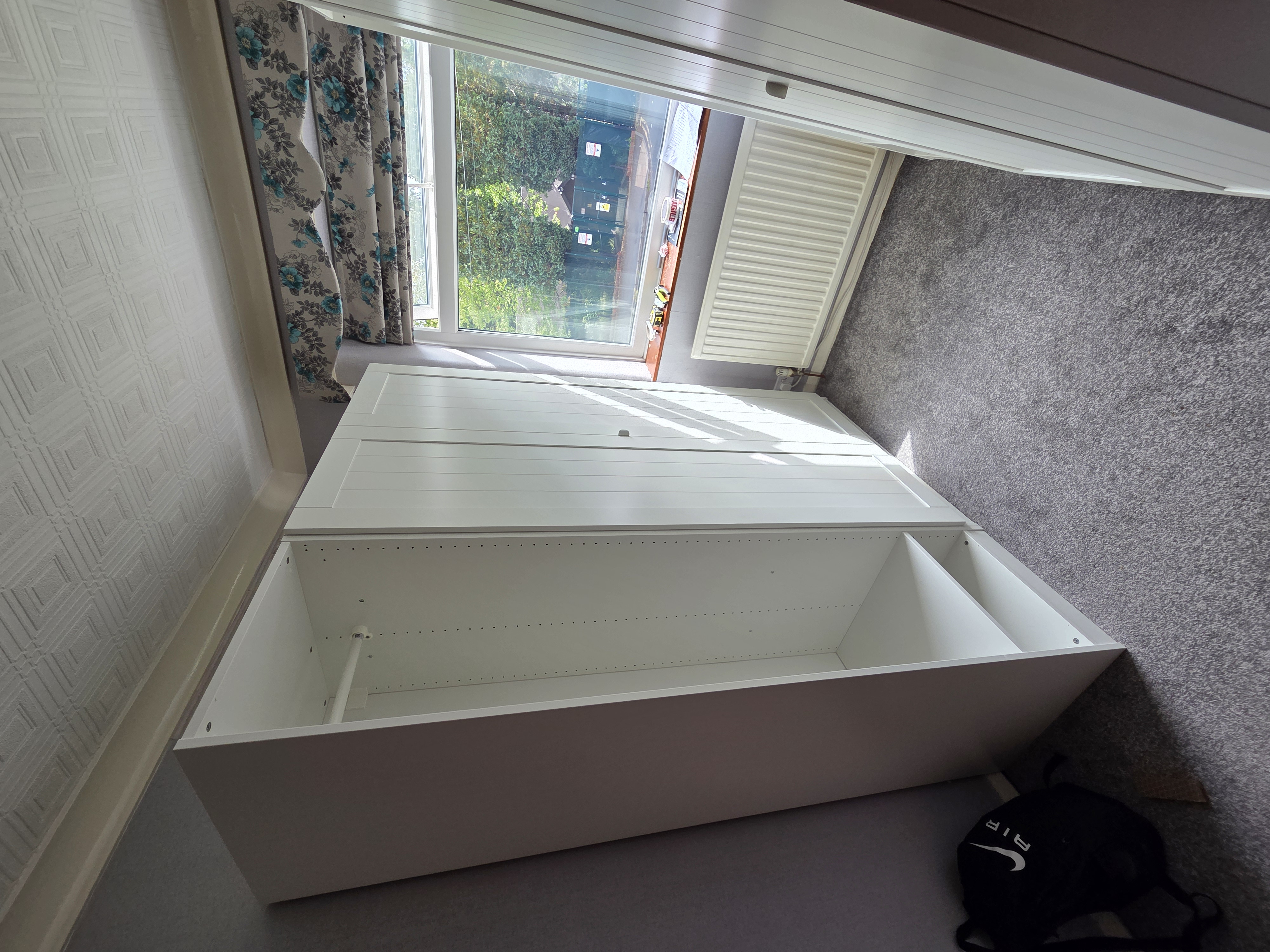 Assembled IKEA wardrobes and blind